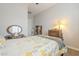 Charming bedroom has a ceiling fan and neutral walls at 10246 W Oberlin Way, Peoria, AZ 85383