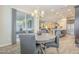 Casual dining area that offers seamless indoor-outdoor flow to outdoor space through sliding doors at 10246 W Oberlin Way, Peoria, AZ 85383
