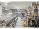 Spacious garage is well-lit, organized with storage and houses a classic car at 10246 W Oberlin Way, Peoria, AZ 85383