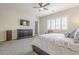 Relaxing main bedroom with comfortable furnishings and convenient access to a private outdoor space at 10246 W Oberlin Way, Peoria, AZ 85383