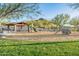 Neighborhood playground featuring a play structure, swings, and covered picnic area with desert views at 10246 W Oberlin Way, Peoria, AZ 85383