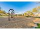 Neighborhood playground with swings, climbing structures, and play areas surrounded by lush desert landscape at 10246 W Oberlin Way, Peoria, AZ 85383