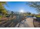 Community playground with slides, swings, and walking path, creating a Gathering-friendly atmosphere at 10246 W Oberlin Way, Peoria, AZ 85383