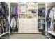 Well-organized walk-in closet offers custom shelving and ample storage space at 10246 W Oberlin Way, Peoria, AZ 85383