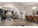 Bright, open-concept living room and dining area with tile flooring and modern decor at 11336 N 117Th Way, Scottsdale, AZ 85259
