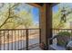 Charming balcony with wrought iron railing and views of desert landscaping at 12050 N Panorama Dr # 104, Fountain Hills, AZ 85268