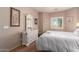 Inviting bedroom with neutral tones and natural light from the window at 12050 N Panorama Dr # 104, Fountain Hills, AZ 85268