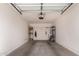 Spacious garage featuring ample storage with shelves and an automatic door opener at 12050 N Panorama Dr # 104, Fountain Hills, AZ 85268