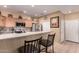 Modern kitchen featuring granite counters, stainless steel appliances and a breakfast bar with seating at 12050 N Panorama Dr # 104, Fountain Hills, AZ 85268