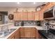 Bright kitchen with stainless steel appliances and plenty of cabinet space at 12050 N Panorama Dr # 104, Fountain Hills, AZ 85268