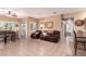 Spacious living room with tile flooring, comfortable seating, and a dining area flooded with natural light at 12050 N Panorama Dr # 104, Fountain Hills, AZ 85268