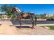 Unique metal horse sculpture adds artistic flair to the outdoor space at 12050 N Panorama Dr # 104, Fountain Hills, AZ 85268