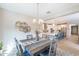 The dining area showcases an open layout, with decor, and a view to the kitchen at 12117 W Luxton Ln, Avondale, AZ 85323