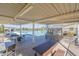 Community pool area with outdoor kitchen, barbecue, seating, and covered patio at 12117 W Luxton Ln, Avondale, AZ 85323
