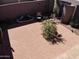 Birds eye view of a brick patio with seating arrangements surrounded by desert landscaping at 12822 W Ballad Dr, Sun City West, AZ 85375