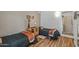 Comfortable bedroom with neutral decor and hard surface flooring at 12822 W Ballad Dr, Sun City West, AZ 85375