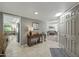 Welcoming entryway with tile flooring and views into the living and kitchen areas at 12822 W Ballad Dr, Sun City West, AZ 85375