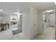 Hallway leading to living spaces, laundry, and bedrooms at 12822 W Ballad Dr, Sun City West, AZ 85375