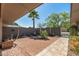 Private patio area with desert landscaping, providing a tranquil outdoor retreat at 12822 W Ballad Dr, Sun City West, AZ 85375