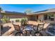 Relaxing front patio area with stylish seating, desert landscaping, and a peaceful ambiance at 12822 W Ballad Dr, Sun City West, AZ 85375