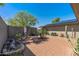 Cozy outdoor patio space with desert landscaping, perfect for enjoying outdoor living at 12822 W Ballad Dr, Sun City West, AZ 85375