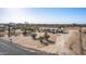 Charming single Gathering house with covered parking and porch sits in a natural desert landscape at 15001 W Camdon Dr, Casa Grande, AZ 85194