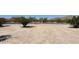 The property boasts a desert landscape and offers a blank canvas for landscaping or development at 15001 W Camdon Dr, Casa Grande, AZ 85194
