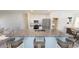 Open kitchen with a large island, stainless steel appliances, and a breakfast bar at 15660 W Deanne Dr, Waddell, AZ 85355