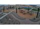 Playground with climbing structure, picnic area, and walking paths at 15660 W Deanne Dr, Waddell, AZ 85355