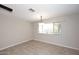 Bright dining area featuring a modern chandelier and ample natural light, perfect for Gathering gatherings at 1966 E Pebble Beach Dr, Tempe, AZ 85282