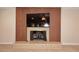 Living room fireplace with brick, custom decorative wall, hearth and mantle provides a focal point in the room at 1966 E Pebble Beach Dr, Tempe, AZ 85282