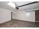The garage features built-in storage and a large open space at 1966 E Pebble Beach Dr, Tempe, AZ 85282