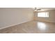 Bright, tiled living area with a large window allowing for plenty of natural light at 1966 E Pebble Beach Dr, Tempe, AZ 85282