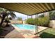 Beautiful pool with lush landscaping, great for outdoor enjoyment and relaxation at 1966 E Pebble Beach Dr, Tempe, AZ 85282