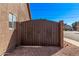Wrought iron gate leading to the side yard of this home for added privacy and curb appeal at 19801 N 6Th Pl, Phoenix, AZ 85024