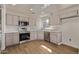 Updated kitchen with new appliances, flooring, and countertops at 19801 N 6Th Pl, Phoenix, AZ 85024