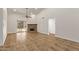 Bright living room with tile flooring, fireplace, and sliding door to the outside at 19801 N 6Th Pl, Phoenix, AZ 85024