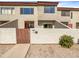 Inviting townhouse features a private courtyard, offering a charming and secure entrance at 2121 S Pennington -- # 58, Mesa, AZ 85202