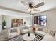 Bright living room featuring modern furnishings, stylish decor, and a sliding door to the back at 2121 S Pennington -- # 58, Mesa, AZ 85202