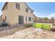 Spacious backyard featuring a small grassy area, partial fencing and a patio with BBQ at 21366 E Alyssa Rd, Queen Creek, AZ 85142