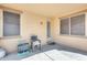 Covered patio with exterior door to the backyard at 21366 E Alyssa Rd, Queen Creek, AZ 85142