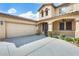 Charming home with two-car garage and covered porch with beautiful landscaping at 21366 E Alyssa Rd, Queen Creek, AZ 85142