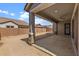 The covered patio provides a comfortable spot to enjoy the expansive backyard at 23146 E Canary Way, Queen Creek, AZ 85142