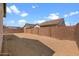 Large backyard with block wall, ready for your personal touch at 23146 E Canary Way, Queen Creek, AZ 85142