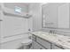 Bright bathroom featuring granite counters, a shower-tub combo, and modern fixtures at 23146 E Canary Way, Queen Creek, AZ 85142