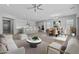 Open-concept living space with kitchen, dining, and living area at 23146 E Canary Way, Queen Creek, AZ 85142