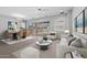 Open-concept living space with kitchen, dining and living area at 23146 E Canary Way, Queen Creek, AZ 85142