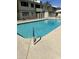 Refreshing community pool surrounded by a secure fence and lounging area in a well-maintained apartment complex at 2605 W Rose Lane -- # B201, Phoenix, AZ 85017