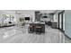 Open-concept kitchen with a center island, seating, and sleek gray cabinetry at 2818 E Malapai Dr, Phoenix, AZ 85028
