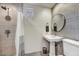 Updated bathroom featuring a stylish sink, tiled walls, and modern fixtures at 31 E Bishop Dr, Tempe, AZ 85282